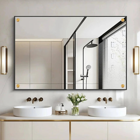 Modern bathroom with mirror reflecting shower, double sinks, and contemporary lighting fixtures.