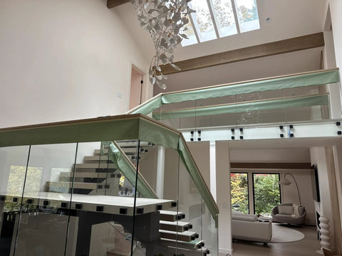 Indoor balcony with glass railings using Heavy Duty Satin Stainless Steel Glass Clamp Standoffs Inline Design 2 Inch For 3/8 1/2 9/16 Inch Glass Thickness Pack Of 2 Marine Grade AISI 316 Stainless Steel For Indoor Outdoor Use On Balconies Decks And Stairs Railings.