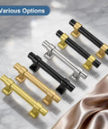Various gold, black, and silver cabinet drawer pulls displayed on marble. 10 Pack 2.5 Inch Gold Cabinet Drawer Pulls Champagne Gold Modern Handles.