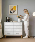 Woman arranging flowers by a dresser with 10 Pack 5 Inch Gray Kitchen Cabinet Handles Modern Cabinet Pulls for Cabinets