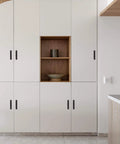 Barn Door Handles 2 Pack Sliding Door Handle 5" Hole Center Barn Door Handles Black Cabinet Handles installed on white kitchen cabinets.
