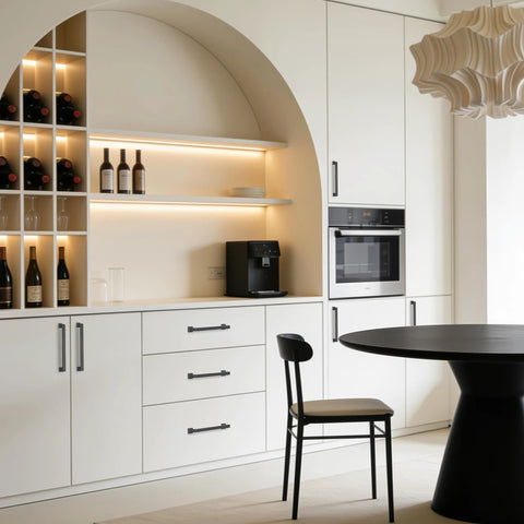 Modern kitchen with 10 Pack 5 Inch Gray Kitchen Cabinet Handles on white cabinets and black table