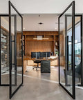 Contemporary home office with glass double doors, wooden shelves, and modern desk setup