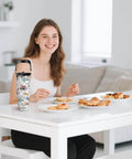 Woman at table with 30 Oz Mom Tumbler With Handle Stainless Steel Insulated Travel Cup With Straw Gift For Mom.