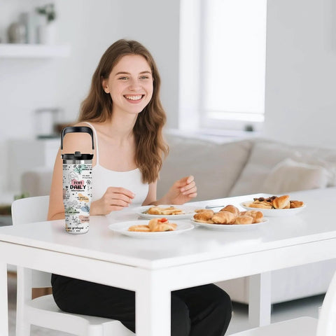 Woman at table with 30 Oz Mom Tumbler With Handle Stainless Steel Insulated Travel Cup With Straw Gift For Mom.
