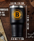 Man The Myth The Legend Monogram Stainless Steel Travel Tumbler For Men 30 Oz on a table with coffee beans and newspaper