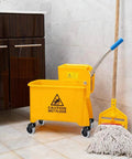 3 Inch Mop Bucket Wheel Replacement Set Of 4 Non Marking TPR Castors For Rubbermaid Models 7570 L2 7571 7580 7581 7582 7583 WaveBrake Compatible Plug And Play Design Durable Non Marking TPR Wheels For Quiet Operation And Easy Replacement installed on a yellow mop bucket.