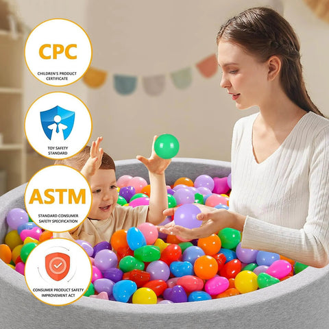 Adult and child playing with Ball Pit Balls Pack of 100 - Phthalate Free BPA Free Crush Proof Plastic Ball in ball pit
