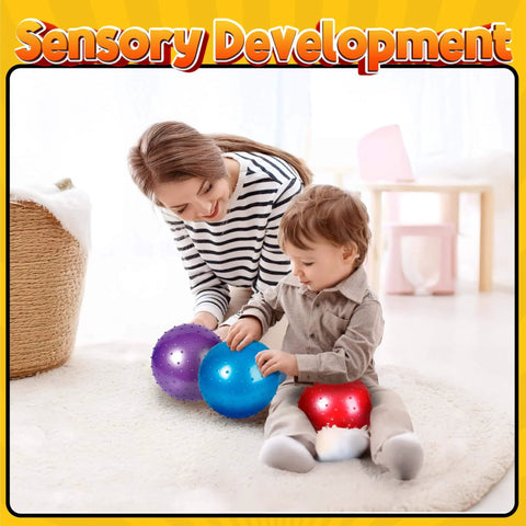Child playing with Mini Knobby Balls - (Pack of 12) Bulk 5 Inch Sensory Balls and Spiky Massage Stress Balls with Pump, fun for sensory development.