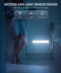 10inch Under Cabinet Lighting, 2 Pack Rechargeable Motion Sensor Light Indoor illuminating a dark kitchen corner at night
