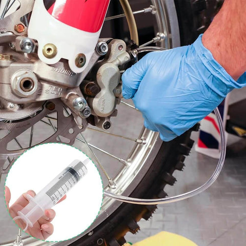 Using Brake Bleed Kit, Hydraulic Disc Clutches Bleeding Kit 100ML Syringe 50cm Hose on motorcycle brake system repair.