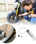 Brake Bleed Kit, Hydraulic Disc Clutches Bleeding Kit 100ML Syringe 50cm Hose in use for motorcycle brake system maintenance