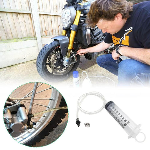 Brake Bleed Kit, Hydraulic Disc Clutches Bleeding Kit 100ML Syringe 50cm Hose in use for motorcycle brake system maintenance