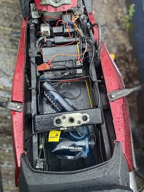 X System 3.0 Plus Electronic Automatic Motorcycle Chain Lubrication System with Bluetooth App Control installed with Traveller Expansion Bag