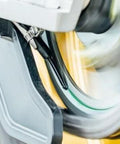 Close-up of Micro XSystem 3 Point 0 Plus Electronic Automatic Motorcycle Chain Lubrication System with dual injector in use