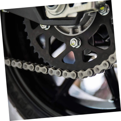 Close-up of roller chain installed on a sprocket, part of the 10 Pieces Heavy Duty Roller Chain Connecting Links Set For Chain Connectors And Roller Chains In Steel Connecting Link Buckle Durable Chain Accessories For Reliable Fastening And Long Service Life.