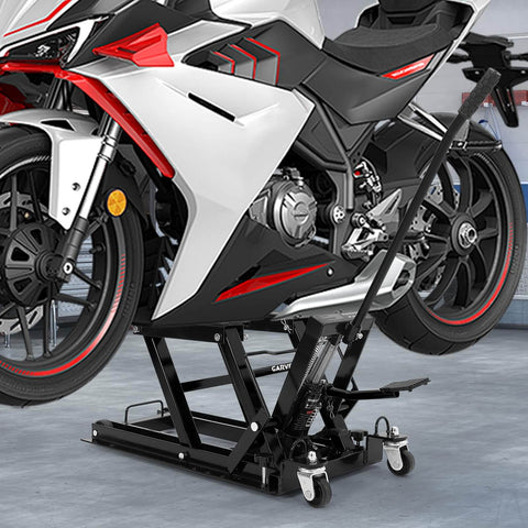 Beefy 1500 Lb Hydraulic Motorcycle Lift Jack With Adjustable Height From 4.7 To 14.57 Inches, lifting a motorcycle in a garage.