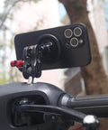 20mm Ball Adapter With M8 Stud For Motorcycle GPS And Dash Cam Mounts attached to handlebar, with smartphone in position