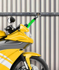 Yellow motorcycle secured with 12 Pack L Track Stud Fittings For Cargo Tie Downs against metal wall, stainless steel O ring visible.