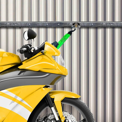 Yellow motorcycle secured with 12 Pack L Track Stud Fittings For Cargo Tie Downs against metal wall, stainless steel O ring visible.