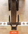 Heavy Duty Motorcycle Wheel Chock For Trailers That Connects To X Track And E Track Systems And Stabilizes Front Or Rear Wheel, Fits Up To 7 Inch Wide Tires, Ideal For Secure Hauling On The Move CargoSmart installed with tire