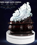 Motorized 360 Degree Rotating Display Stand for Jewelry and Collectibles with statue, 5.43 inches, adjustable angles.