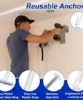 Man installing TV mount with Heavy Duty Drywall Anchors Kit With Included 1/4-20 Bolts Holds Up To 270 Pounds Per Anchor For 1/2 Inch Drywall.