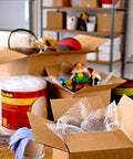 Boxes packed for moving with Scotch Sure Start Packing Tape Clear 1.88 In X 22.2 Yd 6 Dispenser Rolls Quiet Unwind Easy Start Strong Hold