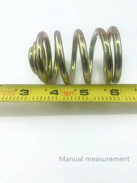 Two Pack Replacement Mower Compression Seat Springs 283516 For John Deere with tape measure for size reference.