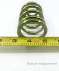 Two Pack Replacement Mower Compression Seat Springs 283516 with tape measure showing dimensions