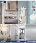 Bathroom interiors showing glass, mirrors, tiles, and smooth metal surfaces with sleek modern design.