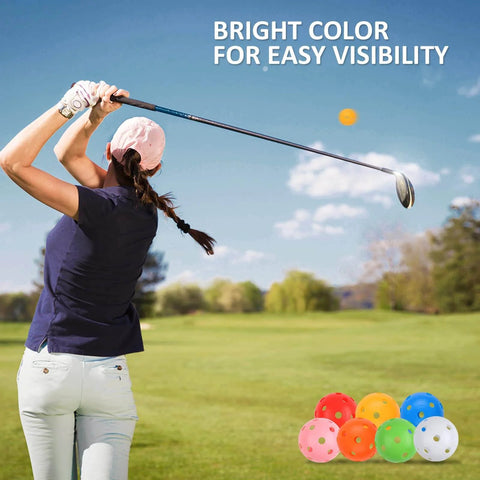 Woman swinging club with Practice Golf Balls 24 Pack, multicolor 42mm plastic balls, in background for backyard training and visibility.