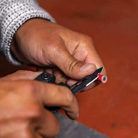 Using the Suspension-NXT 15-In-1 EDC Multi Tool With Pocket Knife for wire stripping