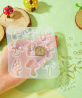 Hand holding mushroom mold from Mushroom Earring Mold Kit For Resin Jewelry Making With Silicone Mold Includes 40 Hooks 60 Jump Rings 50 Ear Nuts For Dangle Earrings Diy Jewelry Supplies Cheriswelry