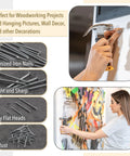 Bulk picture hanging kit with 600 galvanized nails in four sizes plus an 8 ounce hammer in use for DIY wall decor and projects.