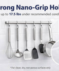 5 Pack Double Sided Nano Grip Go-To Mounting Tape With 50 Feet Total, holding kitchen utensils on white tiles.