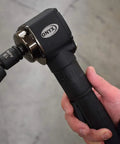 Hand holding Pinless Nano Universal Impact Socket Set For Three Eighths Inch Drive Pro Grade Workhorse Ten Piece Set With Sizes Ten Through Eighteen Millimeter 360 Degree Rotating Head Ultra Short Profile Forged Cro Mo Lifetime Warranty Astro Pneumatic Tool.