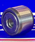 Close-up of NAST6ZZ Track Needle Roller Shielded Bearing 6x19x14mm showing side profile on a blue background.