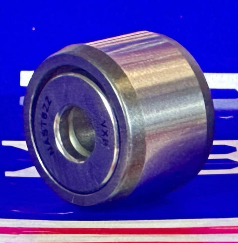 Close-up of NAST6ZZ Track Needle Roller Shielded Bearing 6x19x14mm showing side profile on a blue background.