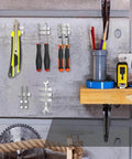Six Pack Neodymium Bar Magnets With Adhesive Backing 60x10x3mm 18 Lb Pull for tools on a wall in a workshop setting