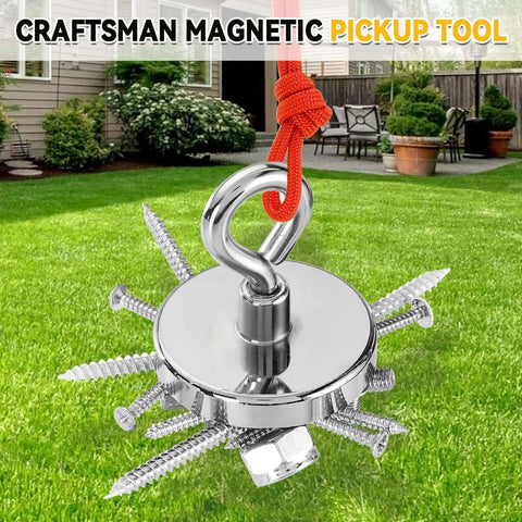2 Inch Neodymium Fishing Magnet with 350 lb pull heavy duty salvage tool picking up metal screws in a garden setting