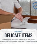 Person wrapping glass with Newsprint Packing Paper Sheets For Moving 10 Lb 320 Sheets 27 By 17 Made In USA For Wrapping Dishes And Fragile Items