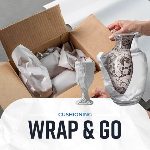 Person wrapping a vase with Newsprint Packing Paper Sheets For Moving 10 Lb 320 Sheets 27 By 17 Made In USA For Wrapping Dishes