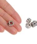 Close-up of a hand holding one of the 10pcs Set Screw Collars 5.05mm Bore Shaft Collars, with four more visible, 10mm OD, nickel-plated.