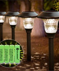 NiMH AA 600mAh 1.2V Rechargeable Batteries For Solar Lights 12 Pack shown with solar garden lamps