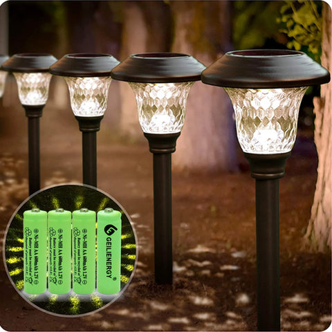 NiMH AA 600mAh 1.2V Rechargeable Batteries For Solar Lights 12 Pack shown with solar garden lamps