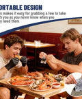 Two men eating seafood at a restaurant table; one wears Nitrile Disposable Gloves 5 Mil Latex Free Powder Free Individually Wrapped.