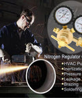 Man using nitrogen regulator 0 to 600 PSI CGA580 inlet for HVAC purging and soldering shown with heavy duty handle and gauges.