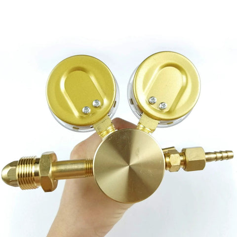 Nitrogen Regulator High Pressure Single Stage Piston Style Forged Brass Body Inlet CGA 580 0 To 4000 Psi Output 0 To 4000 Psi Nine Sixteenths Inch Eighteen Thread Outlet Pro Grade High Flow For Welding Gas Filling And Industrial Use, shown from top view with dual gauges.