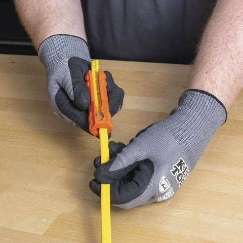 Person using Five In One Cable Stripping Tool for 12 to 14 AWG NM Cable Jacket Slitting and Precision Insulation Stripping